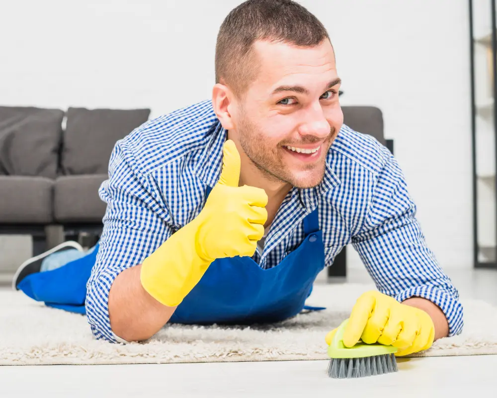 man cleaning his house